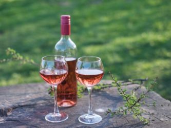 Rosé wine is made by removing skins from red grapes. Dulin/Getty Images