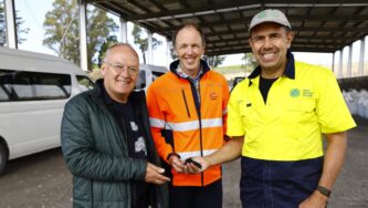 Checking a handful of biochar are, from left, Nick Gerritsen, Gavin Beattie from Port Marlborough, and David Savidan of The Green Circle.PENNY WARDLE / MARLBOROUGH EXPRESS