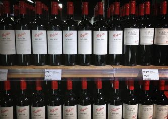 Bottles of Penfolds wine are on sale at a wine shop in central Sydney August 4, 2014. REUTERS/David Gray/File Photo