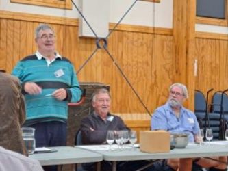 Wayne, with Michael and Murray presenting to the Club